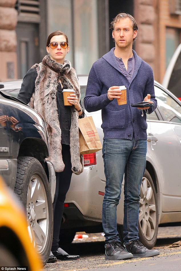 Fab in fur: Parents-to-be Anne and Adam were spotted out on a coffee run in a chilly New York on Monday