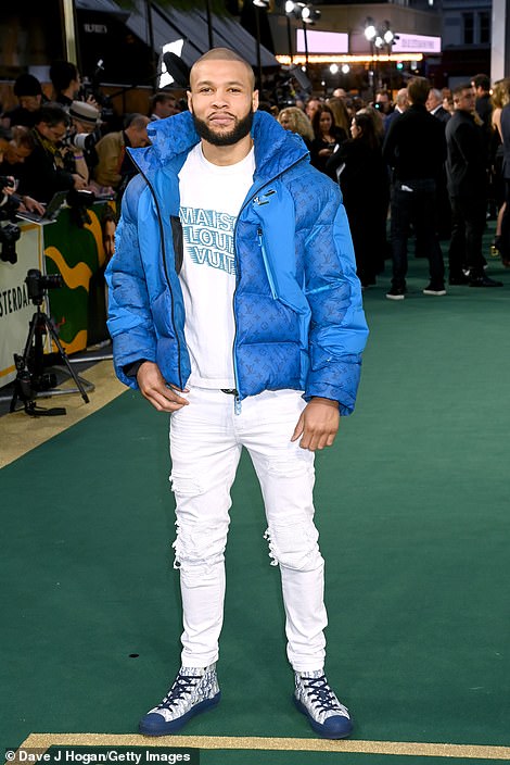 Cool: Chris Eubank Jr looked stylish in a Louis Vuitton padded jacket with a T-shirt by the brand and distressed white jeans