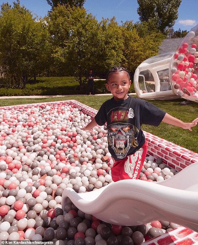 Too cute: 'Happy 4th Birthday my beautiful smart curious baby boy Psalm. I'm just so happy you chose me to be your mommy. You teach me so much every day,' Kim said on her Instagram page