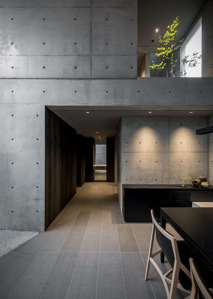 Dining room table in concrete-walled room